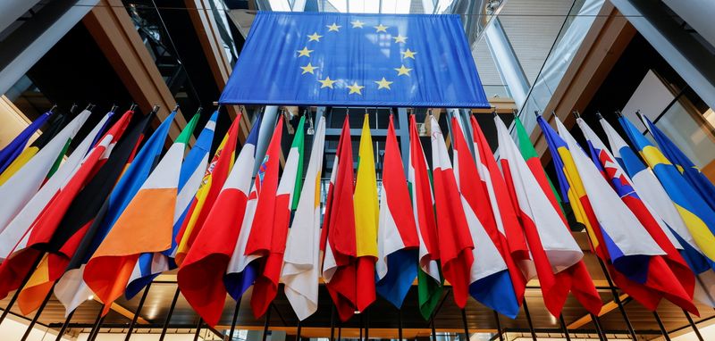 © Reuters. A view of different flags of the European Union Members during a debate on Poland's challenge to the supremacy of EU laws at the European Parliament, in Strasbourg, France, October 19, 2021. Ronald Wittek/Pool via REUTERS