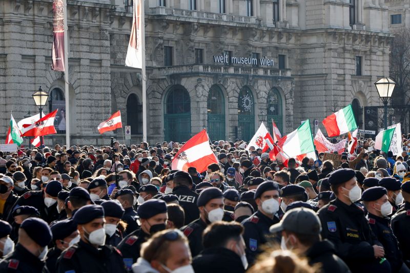 Tens of thousands march in Vienna against COVID measures before lockdown
