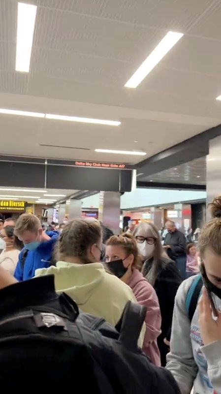 Panic at Atlanta airport after gun accidentally fired