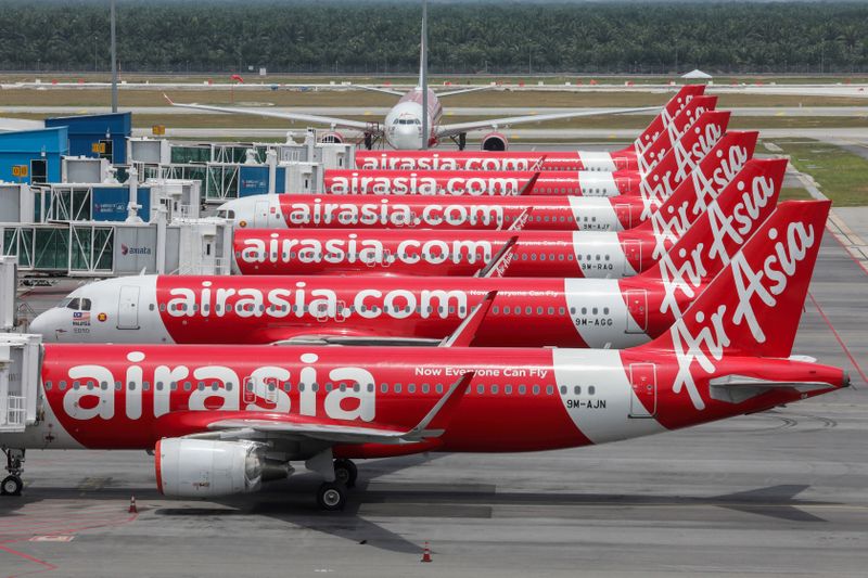 &copy; Reuters. FILE PHOTO: AirAsia planes are seen parked at Kuala Lumpur International Airport 2, during the movement control order due to the outbreak of the coronavirus disease (COVID-19), in Sepang, Malaysia April 14, 2020. REUTERS/Lim Huey Teng