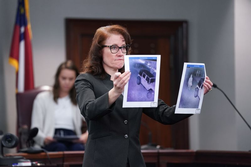 &copy; Reuters. FILE PHOTO: Prosecutor Linda Dunikoski shares evidence during the trial of the killers of Ahmaud Arbery at the Glynn County Courthouse in Brunswick, Georgia, U.S., November 18, 2021. Sean Rayford/Pool via REUTERS/File Photo