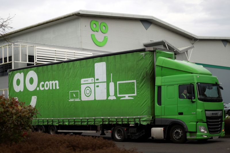 &copy; Reuters. A truck is pictured outside the AO distribution centre in Crewe, Cheshire, Britain November 24, 2020. REUTERS/Carl Recine/File Photo