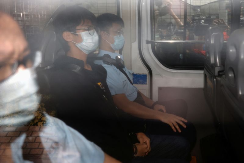 &copy; Reuters. FILE PHOTO: Former convenor of pro-independence group Studentlocalism, Tony Chung Hon-lam arrives at West Kowloon Magistrates‘ Courts in a police van after he was arrested under the national security law, in Hong Kong, China October 15, 2020. REUTERS/Ty
