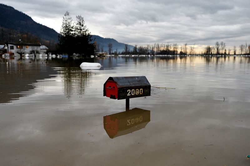 &copy; Reuters. FILE PHOTO: Flood water is seen a week after rainstorms lashed the western Canadian province of British Columbia, triggering landslides and floods, shutting highways, in Abbottsford, British Columbia, Canada November 22, 2021.  REUTERS/Jennifer Gauthier/F
