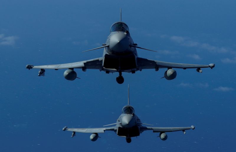 &copy; Reuters. FILE PHOTO: Two Eurofighters of the Spanish Air Force are seen in-flight during the Ocean Sky 2021 Military Exercise for advanced air-to-air training in the southern airspace of the Canary Islands, Spain, October 21, 2021. REUTERS/Borja Suarez/File Photo