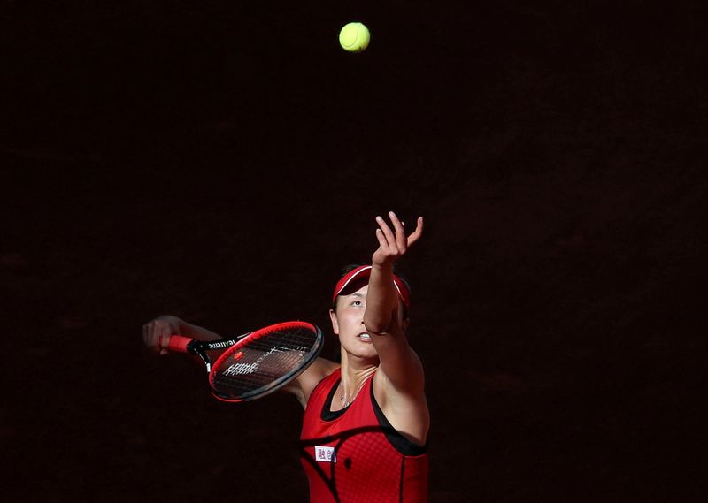 &copy; Reuters. FILE PHOTO: Tennis - WTA Mandatory - Madrid Open - Madrid, Spain - May 6, 2018   China's Peng Shuai in action against Spain's Garbine Muguruza during their round of 64 match   REUTERS/Susana Vera