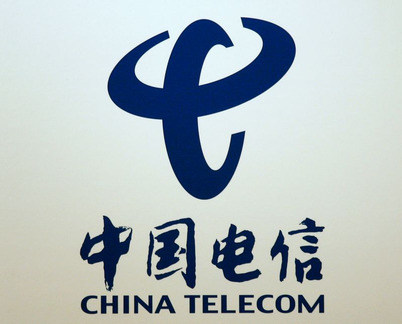 &copy; Reuters. FILE PHOTO: The company logo of China Telecom is displayed at a news conference in Hong Kong March 24, 2009. REUTERS/Bobby Yip  