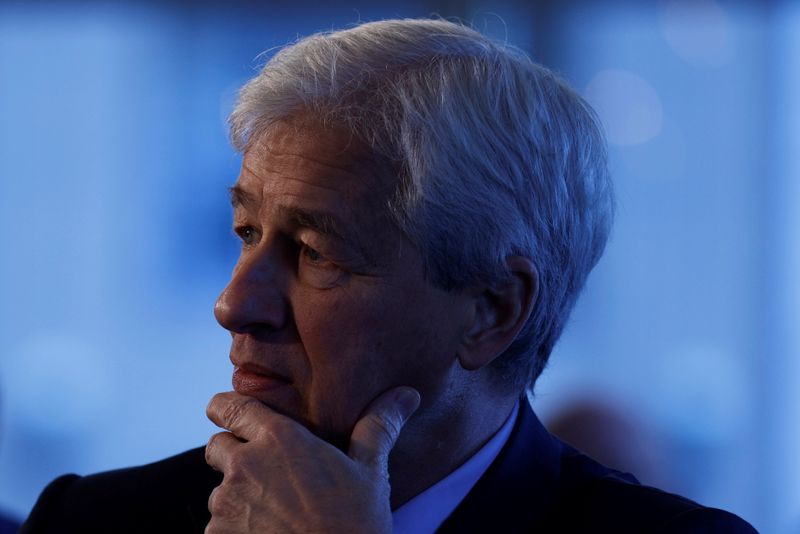 © Reuters. JP Morgan CEO Jamie Dimon listens as he is introduced at the Boston College Chief Executives Club luncheon in Boston, Massachusetts, U.S., November 23, 2021.    REUTERS/Brian Snyder