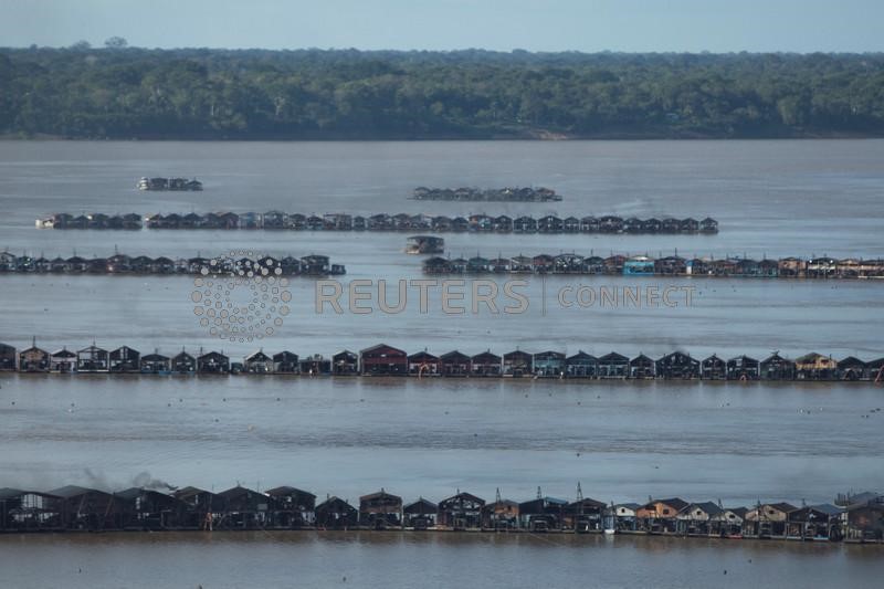 &copy; Reuters. Centenas de balsas de garimpo no rio Madeira em Autazes, no Amazonas
23/11/2021
REUTERS/Bruno Kelly