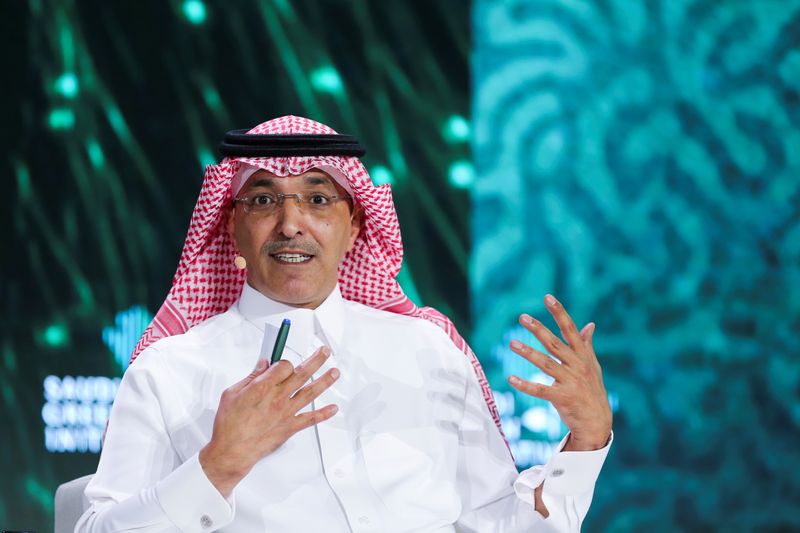 &copy; Reuters. FILE PHOTO: Saudi Minister of Finance Mohammed al-Jadaan gestures as he speaks during the Saudi Green Initiative Forum to discuss efforts by the world's top oil exporter to tackle climate change in Riyadh, Saudi Arabia, October 23, 2021. REUTERS/Ahmed Yos