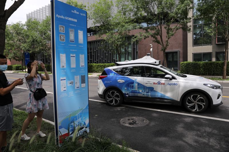 &copy; Reuters. Carro Apollo em Pequim
30/7/2021 REUTERS/Tingshu Wang