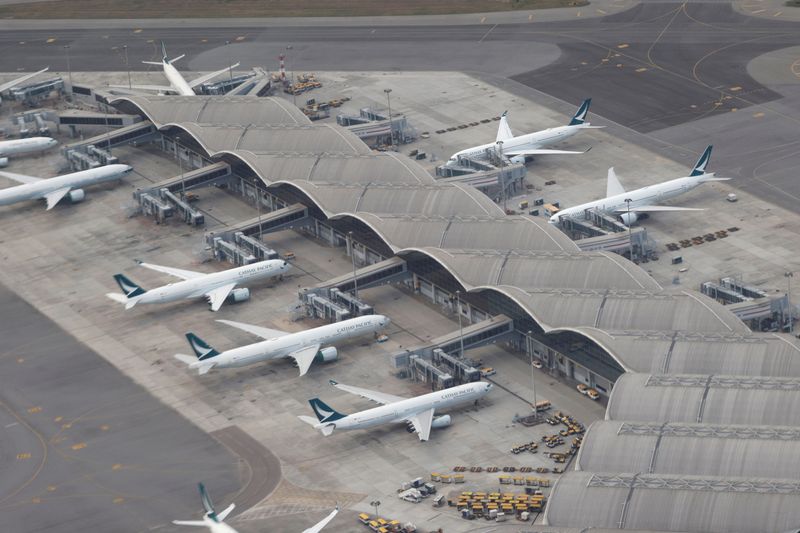 &copy; Reuters. FILE PHOTO: Cathay Pacific planes are parked on the tarmac at Hong Kong International Airport, Hong Kong, China October 24 2020. REUTERS/Tyrone Siu/File Photo