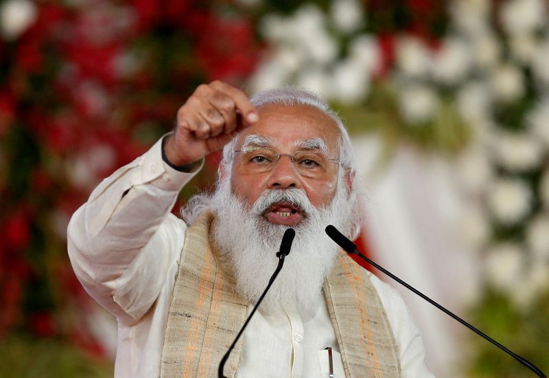&copy; Reuters. FILE PHOTO: India's Prime Minister Narendra Modi addresses a gathering before flagging off the "Dandi March", or Salt March, to celebrate the 75th anniversary of India's Independence, in Ahmedabad, India, March 12, 2021. REUTERS/Amit Dave/File Photo