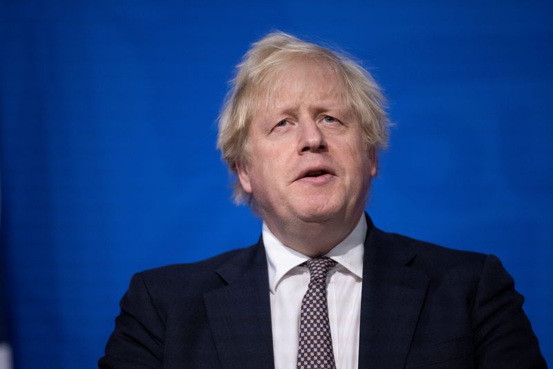 © Reuters. Britain's Prime Minister Boris Johnson speaks as he holds a press conference on the new Omicron coronavirus variant, in London, Britain November 27, 2021. Jeff Gilbert/Pool via REUTERS