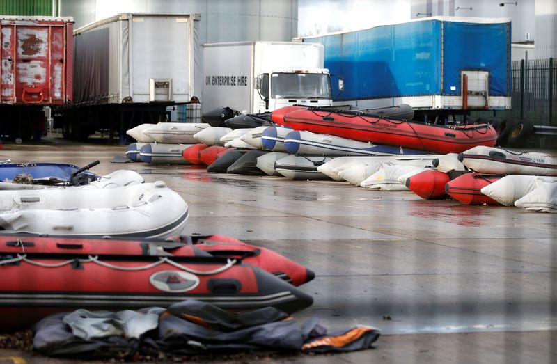 &copy; Reuters. Inflatable boats, believed to have been used by migrants that crossed the English Channel from France, are stored in a secure facility near Dover, Britain, November 26, 2021.  REUTERS/Peter Nicholls
