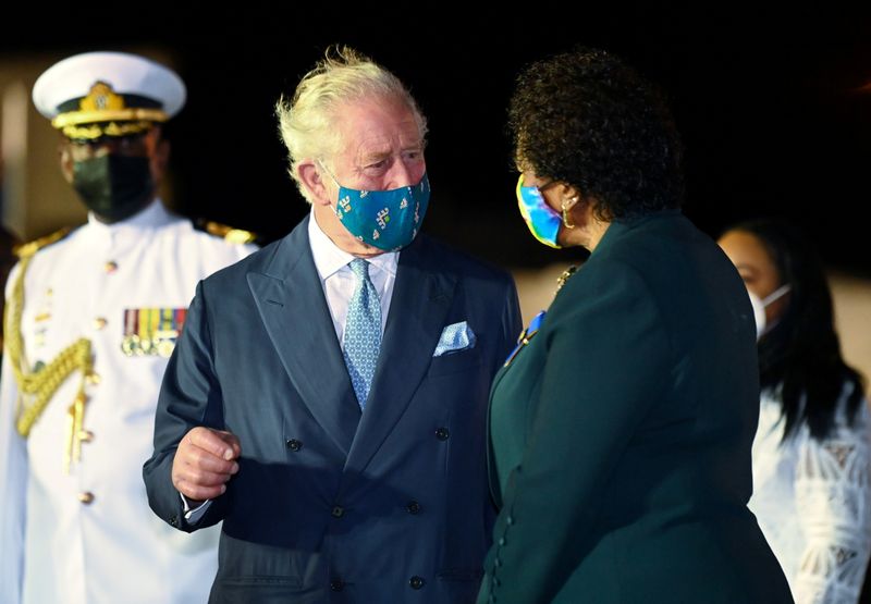 &copy; Reuters. Britain's Prince Charles speaks with Barbados' President-elect Sandra Mason as he arrives at Grantley Adams Airport to take part in events to mark the Caribbean island's transition to a birth of a new republic, Bridgetown, Barbados, November 28, 2021. Pic