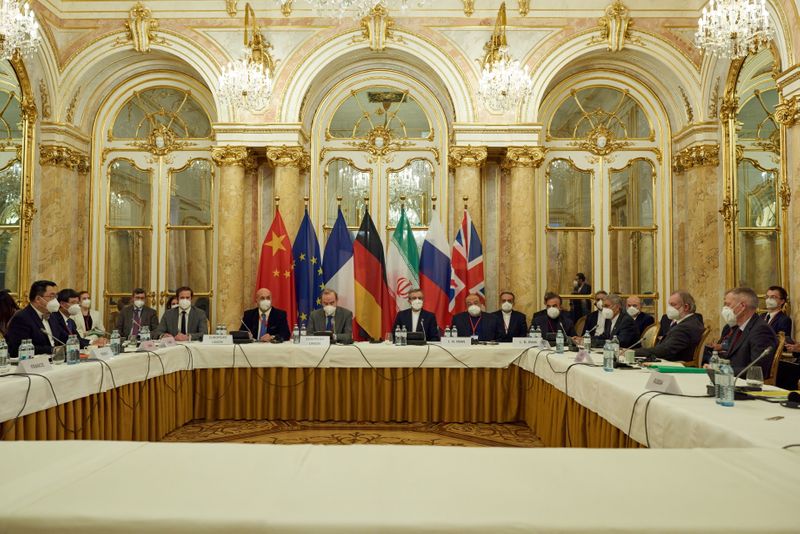 © Reuters. Deputy Secretary General of the European External Action Service (EEAS) Enrique Mora and Iran's chief nuclear negotiator Ali Bagheri Kani wait for the start of a meeting of the JCPOA Joint Commission in Vienna, Austria November 29, 2021. EU Delegation in Vienna/Handout via REUTERS