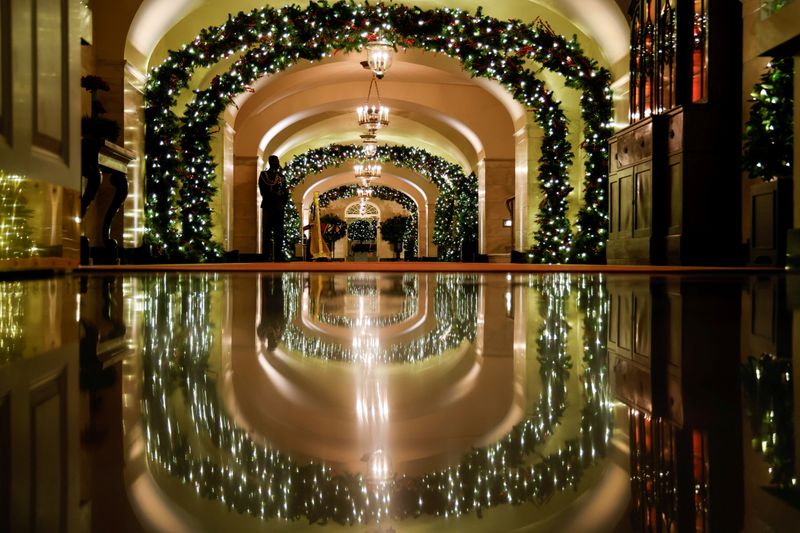 &copy; Reuters. A White House Military Social Aide stands in the Center Hall during a press tour of White House Christmas decorations ahead of holiday receptions by U.S. President Joe Biden and first lady Jill Biden in Washington, U.S. November 29, 2021.  REUTERS/Jonatha