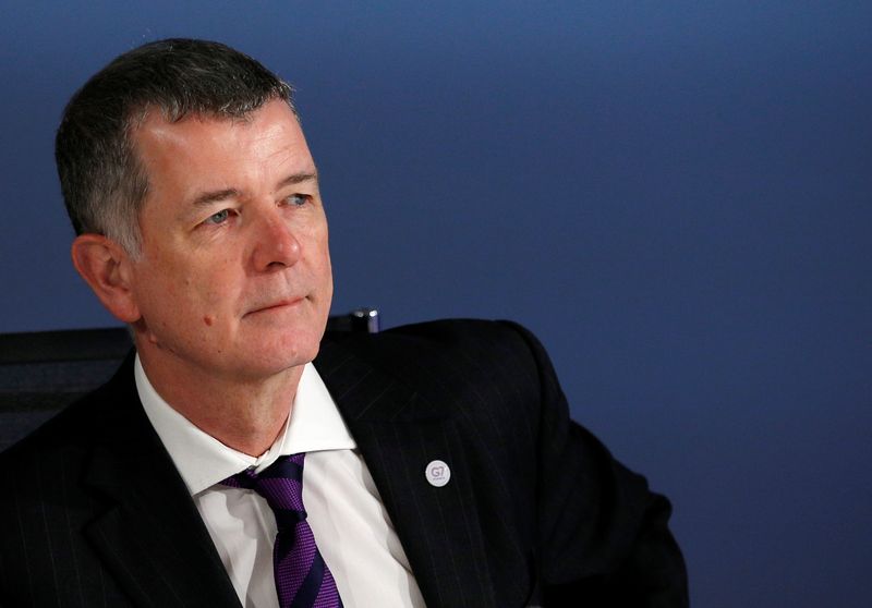 Overconfident China could make miscalculations, British spy chief says