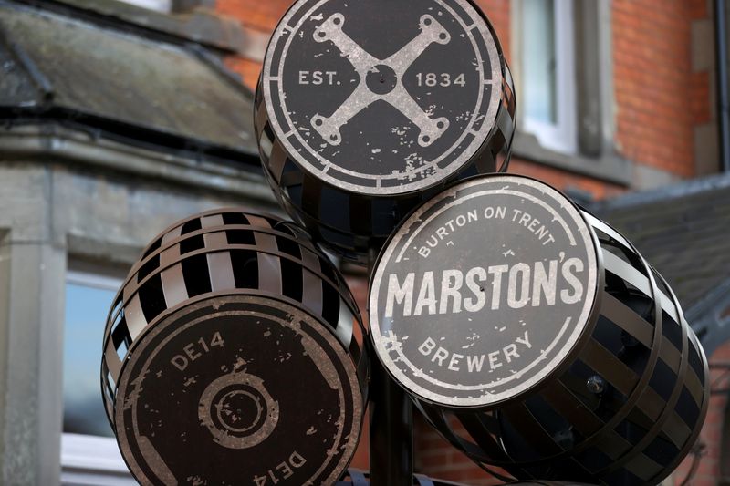 &copy; Reuters. FILE PHOTO: A view shows a metal sculpture of Marston's barrels, following new restrictions to curb the spread of the coronavirus disease (COVID-19) infections, in Shobnall, in Burton-on-Trent, Britain October 15, 2020. REUTERS/Carl Recine/File Photo