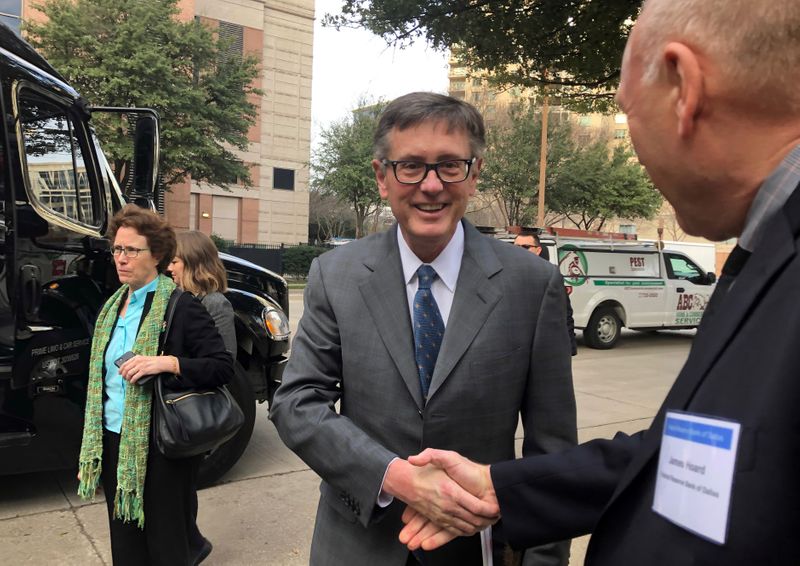 &copy; Reuters. Federal Reserve Vice Chairman Richard Clarida, greets a member of the Dallas Fed staff before boarding a bus to tour South Dallas as part of a community outreach by U.S. central bankers, in Dallas, Texas, U.S., February 25, 2019.   REUTERS/Ann Saphir/File