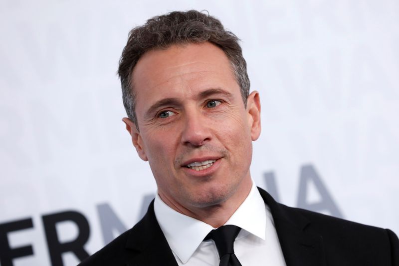 &copy; Reuters. FILE PHOTO: CNN television news anchor Chris Cuomo poses as he arrives at the WarnerMedia Upfront event in New York City, New York, U.S., May 15, 2019. REUTERS/Mike Segar