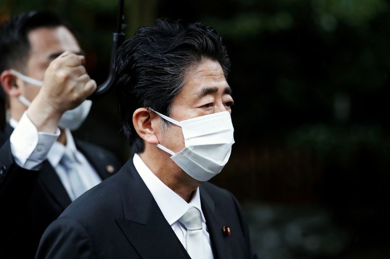 &copy; Reuters. FILE PHOTO: Former Japanese Prime Minister Shinzo Abe visits Yasukuni Shrine in Tokyo, Japan August 15, 2021. REUTERS/Issei Kato