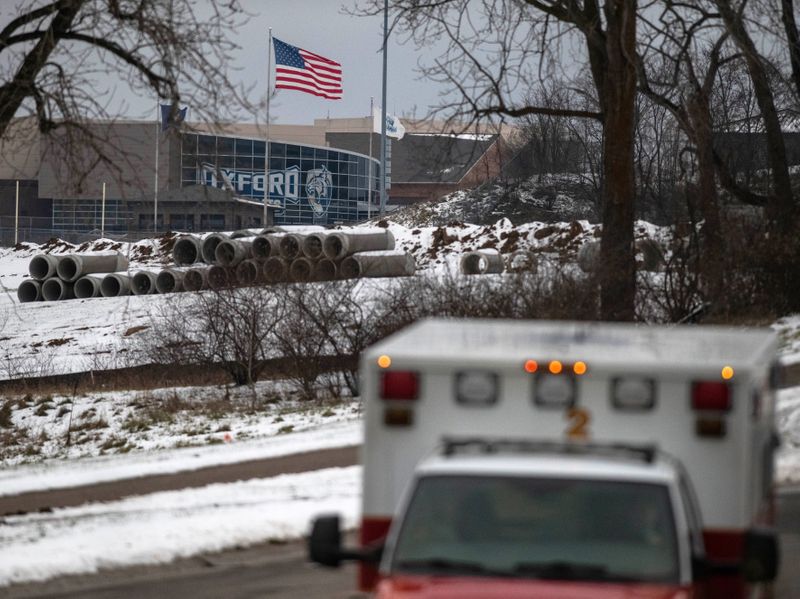 &copy; Reuters. Emergency personnel respond to the scene of a deadly shooting where at least three were killed and six were wounded at a high school in Oxford, Michigan, about 35 miles (55 km) north of Detroit, U.S., November 30, 2021.  REUTERS/Seth Herald