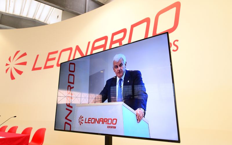 &copy; Reuters. FILE PHOTO: Leonardo's CEO Alessandro Profumo is seen on a screen at the headquarters in Vergiate, near Milan, Italy, January 30, 2018. REUTERS/Massimo Pinca