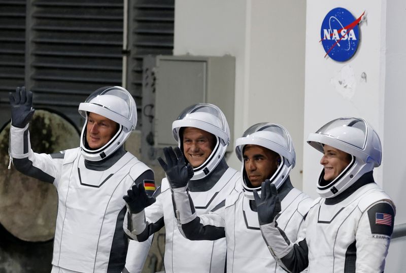 &copy; Reuters. FILE PHOTO: European Space Agency (ESA) astronaut Matthias Maurer of Germany, NASA astronauts Raja Chari, Tom Marshburn, and Kayla Barron wave while departing the crew quarters for launch aboard a SpaceX Falcon 9 rocket on a mission to the International S