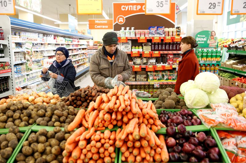&copy; Reuters. Customers shop at a grocery store operated by Russian food retailer Dixy Group in Moscow, Russia, October 20, 2016. REUTERS/Maxim Zmeyev