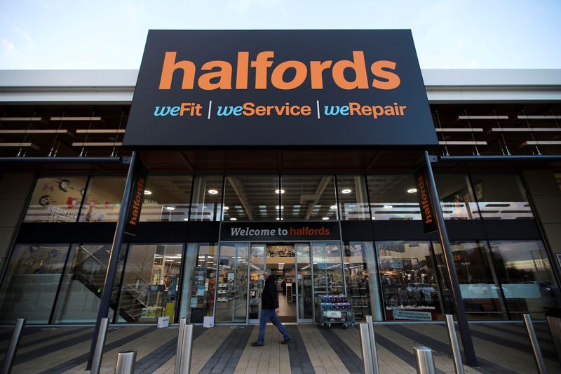 © Reuters. FILE PHOTO: A view of the Halfords store front in Rugby Britain November 19, 2020. REUTERS/Molly Darlington