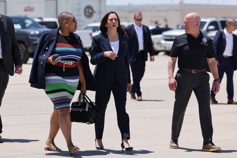 &copy; Reuters. FILE PHOTO: U.S. Vice President Kamala Harris walks with Department of Homeland Security (DHS) Secretary Alejandro Mayorkas and Spokesperson Symone Sanders to board Air Force Two at El Paso International Airport in El Paso, Texas, U.S., June 25, 2021. REU