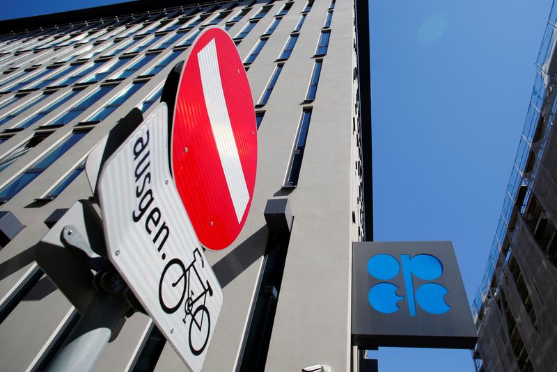 &copy; Reuters. FILE PHOTO: The logo of the Organization of the Petroleoum Exporting Countries (OPEC) and a traffic sign are seen outside of OPEC's headquarters in Vienna, Austria April 9, 2020.  REUTERS/Leonhard Foeger/File Photo