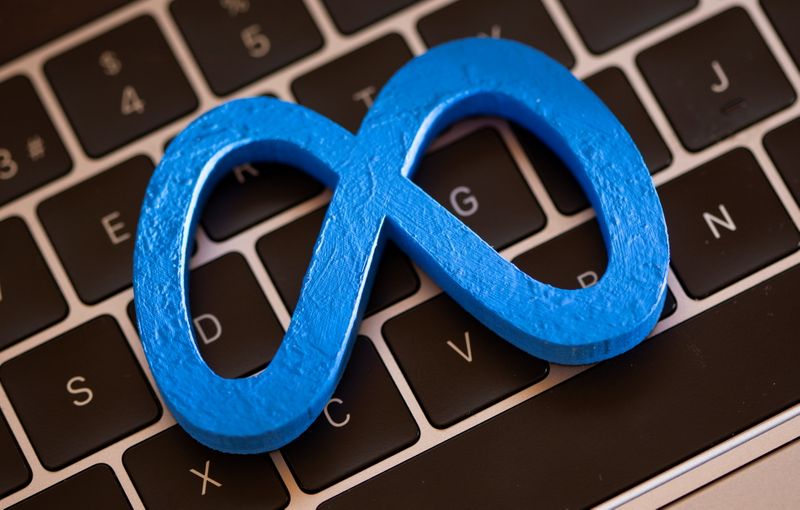 &copy; Reuters. A 3D printed Facebook's new rebrand logo Meta is placed on laptop keyboard in this illustration taken on November 2, 2021. REUTERS/Dado Ruvic/Illustration