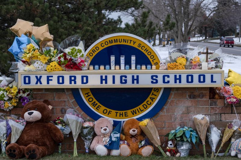 &copy; Reuters. FILE PHOTO: A memorial is seen at Oxford High school, a day after a shooting that left four dead and eight injured, in Oxford, Michigan. December 1, 2021.  REUTERS/Seth Herald