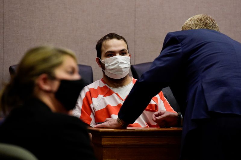 &copy; Reuters. FILE PHOTO: Ahmad Al Aliwi Alissa, suspect of the King Soopers grocery store shooting, appears in a Boulder County District courtroom at the Boulder County Justice Center in Boulder, Colorado, U.S. May 25, 2021.  Matthew Jonas/Boulder Daily Camera/Handout