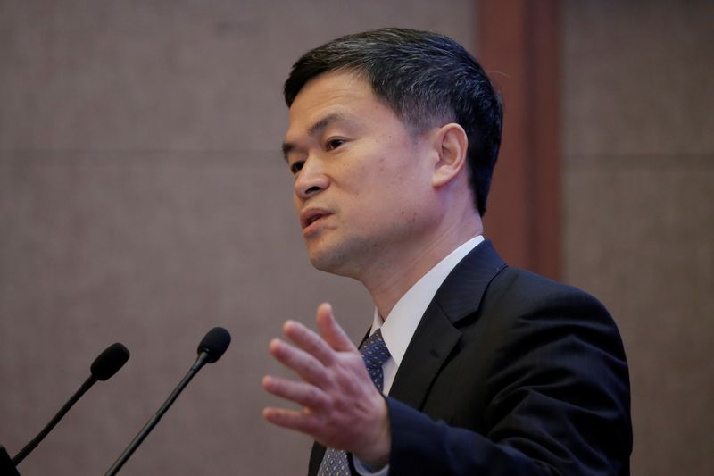 © Reuters. Fang Xinghai of the China Securities Regulatory Commission attends the China Development Forum in Beijing, China March 23, 2019. REUTERS/Thomas Peter