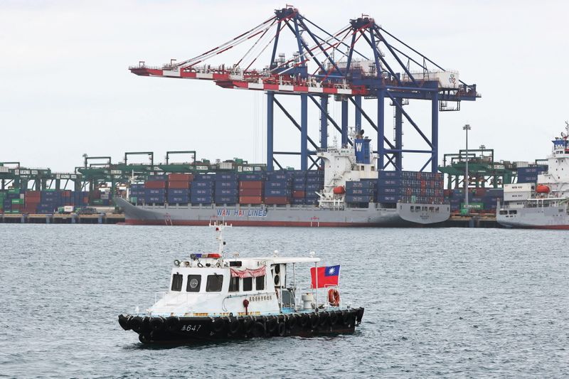 &copy; Reuters. A police boat with a Taiwan flag sails at the Port of Taipei in Taipei, Taiwan, February 9, 2021. REUTERS/Ann Wang