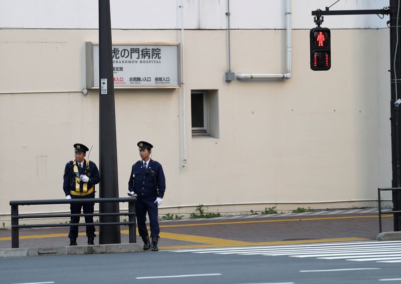 &copy; Reuters. FILE PHOTO: Police officers stand guard near the U.S. embassy in Tokyo, as U.S. President Donald Trump visits Japan, November 5, 2017. REUTERS/Kim Kyung-Hoon