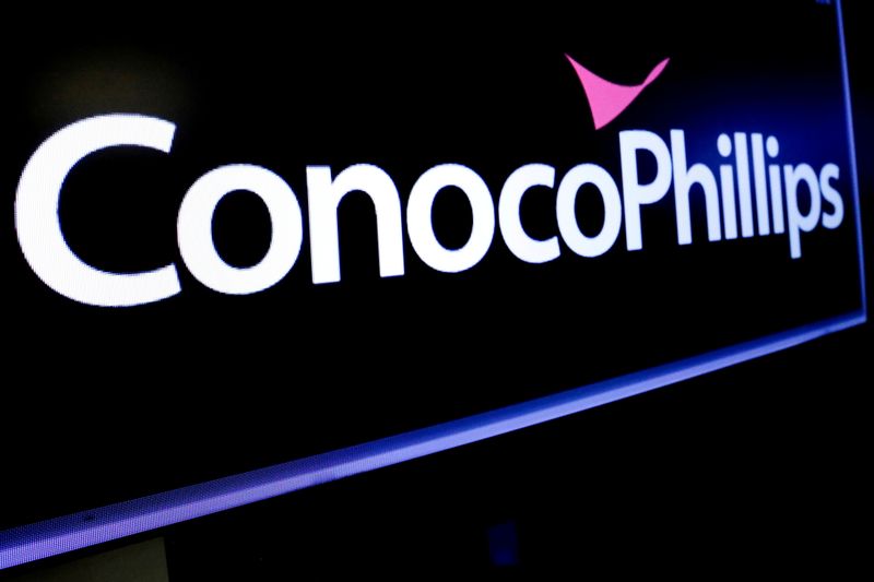 © Reuters. FILE PHOTO: The logo for ConocoPhillips is displayed on a screen on the floor at the New York Stock Exchange (NYSE) in New York, U.S., January 13, 2020. REUTERS/Brendan McDermid/File Photo/File Photo