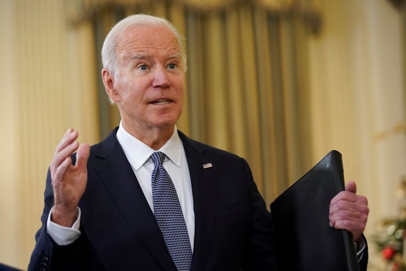 &copy; Reuters. U.S. President Joe Biden speaks with reporters after delivering remarks on the November jobs report at the White House in Washington, U.S., December 3, 2021. REUTERS/Kevin Lamarque