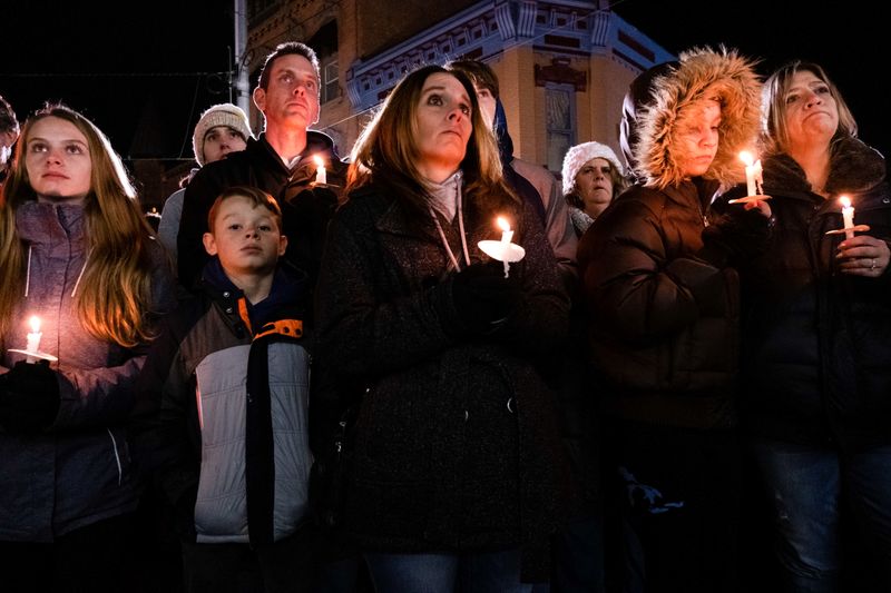 &copy; Reuters. FILE PHOTO: Thousands from the community of Oxford, Michigan gathered Friday for a vigil to remember the students killed after a deadly shooting at  Oxford High School in Oxford, Michigan, north of Detroit, U.S., December 3, 2021.  REUTERS/Seth Herald