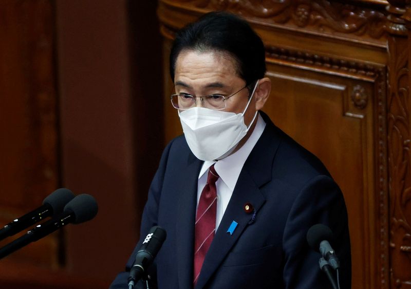 &copy; Reuters. FILE PHOTO: Japan's Prime Minister Fumio Kishida wearing a protective face mask delivers his policy speech at the start of an extraordinary session of the lower house of the parliament, amid the coronavirus disease (COVID-19) pandemic, in Tokyo, Japan Dec