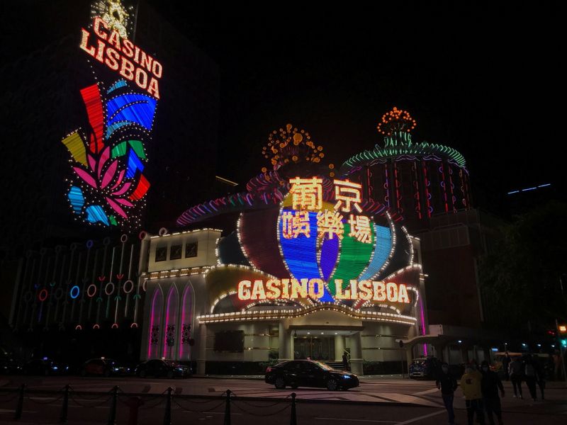 &copy; Reuters. FILE PHOTO: A night view of the Casino Lisboa after gambling recommenced at midnight, in Macau, China February 20, 2020. REUTERS/Aleksander Solum