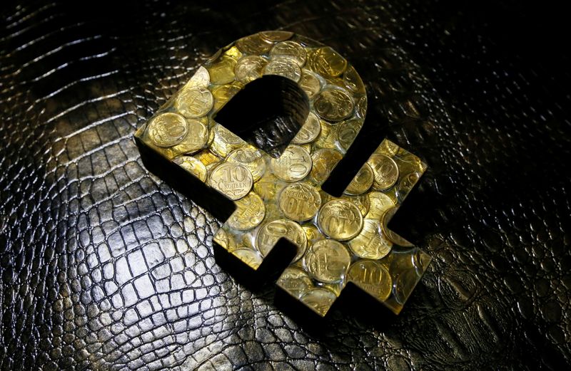 &copy; Reuters. A view shows Russian artist Vasily Slonov's artwork "Rouble Saving Project" depicting the sign of the Russian rouble at a workshop in Krasnoyarsk, Russia in this picture illustration taken January 10, 2019. REUTERS/Ilya Naymushin/Illustration
