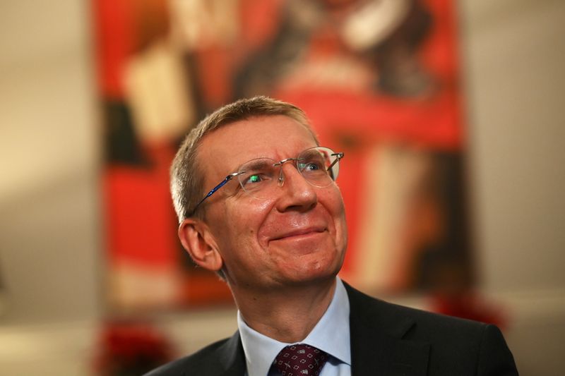 © Reuters. Latvian Foreign Minister Edgars Rinkevics smiles during an interview with Reuters at the Latvian Embassy in London, Britain, December 7, 2021. REUTERS/Dylan Martinez