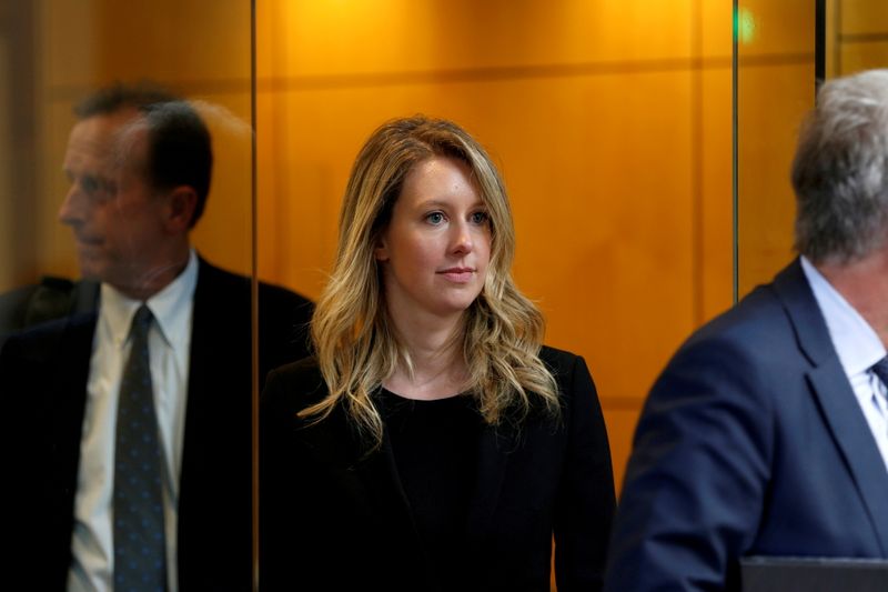 &copy; Reuters. FILE PHOTO: Former Theranos CEO Elizabeth Holmes leaves after a hearing at a federal court in San Jose, California, July 17, U.S., 2019.  REUTERS/Stephen Lam