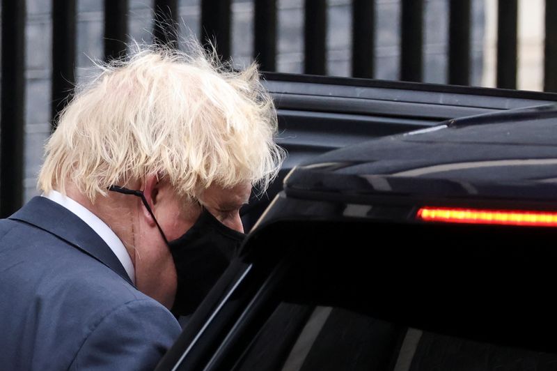 &copy; Reuters. FILE PHOTO: Britain's Prime Minister Boris Johnson gets in a car outside Downing Street in London, Britain, December 8, 2021. REUTERS/Tom Nicholson