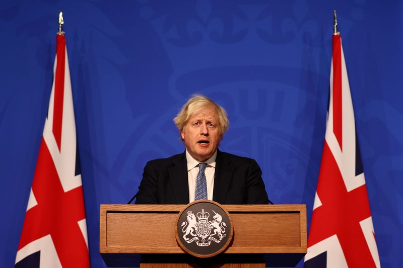 &copy; Reuters. British Prime Minister Boris Johnson holds a news conference for the latest coronavirus disease (COVID-19) update in the Downing Street briefing room, in London, Britain December 8, 2021. Adrian Dennis/Pool via REUTERS